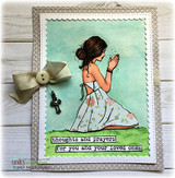Green-matted card with the praying girl, ribbon and charm, 'thoughts and prayers for you and your loved ones.'