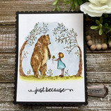 The gently colored bear and girl beneath leafy trees on a clean white panel in a black frame.