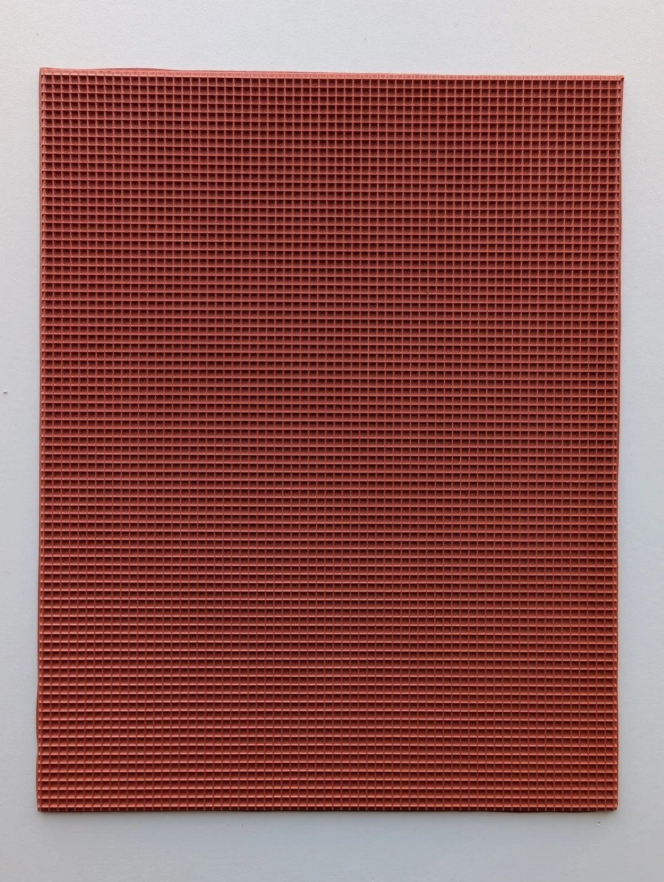 Full red rubber pottery texture mat with a dense repeating grid of small raised squares.
