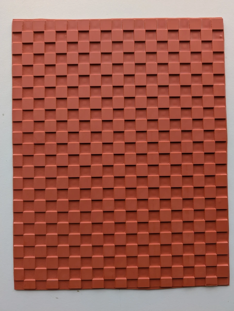 Full 10 × 12 red rubber Woven Checker texture mat with alternating raised square bands.