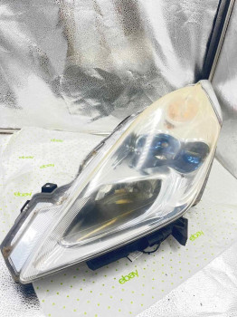 11 12 NISSAN LEAF Headlamp Assembly Left