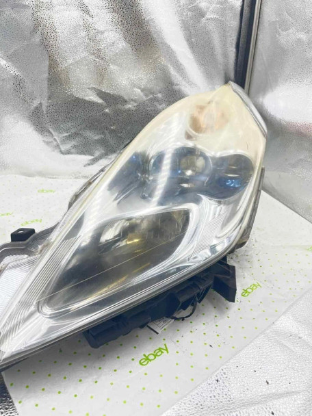 11 12 NISSAN LEAF Headlamp Assembly Left