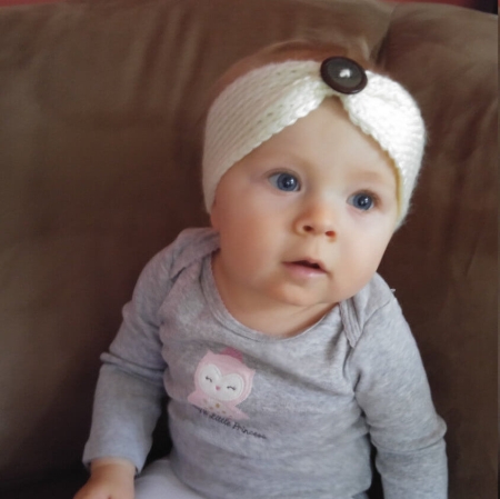 baby with knitted headband head