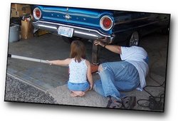 Grandfather and Granddaughter repair 1963 Falcon