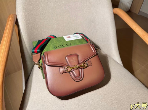 Brown lady web shoulder bag