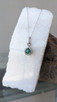 Emerald and Diamond Pear Shaped Drop Pendant Necklace