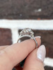 2.59cttw Lab Grown Oval with Half Moon Side Stones Three Stone Engagement Ring- 14KW