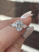 2.40cttw Lab Grown Oval Brilliant with Pear Side Stones Three Stone Engagement Ring- 14KW