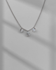 .76cttw Three Stone Diamond Drilled Necklace- 14KW