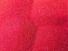 Red colored art sand