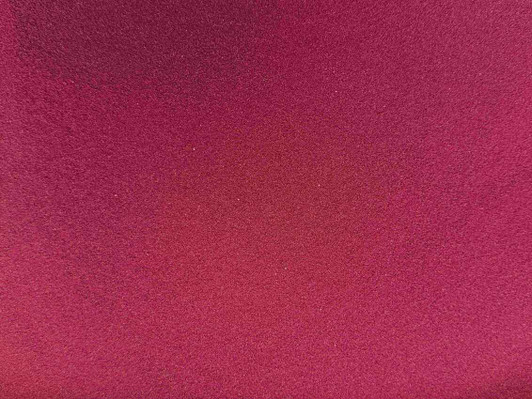 Burgundy colored sand