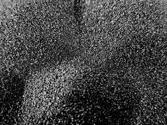 Black colored art sand