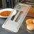 Carlisle 10470U13 StorPlus™ Handled Solid Amber High Heat Universal Lid