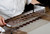 Matfer Bourgeat 385050 Chocolate Tuile Kit 25" L x 6.5"W x 3.75" H Perforated Plate All Stainless Steel Construction