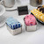 TableCraft Products 58BF 3 1/2" x 2 3/4" x 1 3/4" Stainless Steel Sugar Packet Rack With Brushed Finish - 12/Case