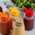 TableCraft Products PP32A 32 Oz. Assorted Top Clear Option Dispenser