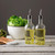 TableCraft Products H932 17 1/2 Oz. Clear Glass Olive Oil Bottle With Stainless Steel Pourer