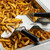 TableCraft Products FFD8 9-1/4" W x 2-1/4" H Black Dual Handle Stainless Steel French Fry Scoop