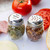TableCraft Products 1260 6 Oz. Stainless Steel Perforated Top Swirled Glass Cheese Shaker