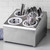 TableCraft Products 7042 12 1/4" W x 10 1/4" D x 8 1/2" H Two Tier Four Holes Stainless Steel Flatware Cylinder Holder