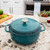 Lodge EC6D38 6 Qt. Lagoon Porcelain Enameled Cast Iron Round Dutch Oven with Cover