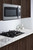 Summit OTRSS301 1.6 Cu. Ft. Stainless Steel Exterior Light Duty Over-the-Range Microwave Oven - 115 Volts