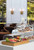 Rosseto BK020 22.4" x 23.25" x 15" H 2 Tier Rectangular Clear Acrylic Curved Front Bakery Case