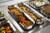 TableCraft Products 123505 18 1/2" x 5 1/4" x 4"  4 1/2 Qt. Without Handles Induction Aluminum Core Mirror Finish Tri-Ply Serving Pan