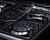 Summit RG2402B 23.5" W Black Finish Stainless Steel 4 Burners with Oven Natural Gas Range - 36,000 BTU