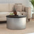 Modern Accent Cylindrical Round Coffee Table with Black Top and Hammered Silver Metal Base, Boho Contemporary Drum Cocktail Table, Glam Accent Center Table for Living Room and Family Room, Assembled