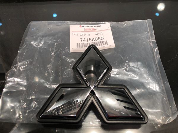 Mitsubishi evo ix front bumper badge