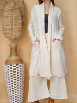 Introducing our Long Gauze Cardigan, the perfect layering piece for warmer months. Crafted with lightweight gauze fabric, this cardigan offers both style and comfort. Its long length makes it ideal for layering over tanks or dresses, while the addition of two side pockets adds a touch of functionality. Elevate your summer wardrobe with this versatile cardigan, perfect for adding a stylish layer to any outfit. 

Made in Thailand by Figwood

Fabric: 100% Cotton