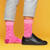 AI-generated styling image of Hooray For Boobies Boob Socks For Women — worn, with shoes