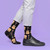 AI-generated styling image of Acoustic Guitar Socks For Men — worn, with shoes