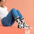 AI-generated styling image of Moo! Cow Socks For Women — on a model
