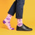 AI-generated styling image of Muthafuckin' Girl Power Socks For Women — worn, with shoes