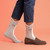 AI-generated styling image of Leg Eater Shark Socks For Women — worn, with shoes