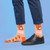 AI-generated styling image of Hold My Nuts Squirrel Socks — worn, with shoes