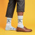 AI-generated styling image of Blow Me Socks For Men — worn, with shoes