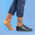 AI-generated styling image of Poop Emoji Happens — worn, with shoes