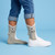 AI-generated styling image of Shark Eating Leg — worn, with shoes