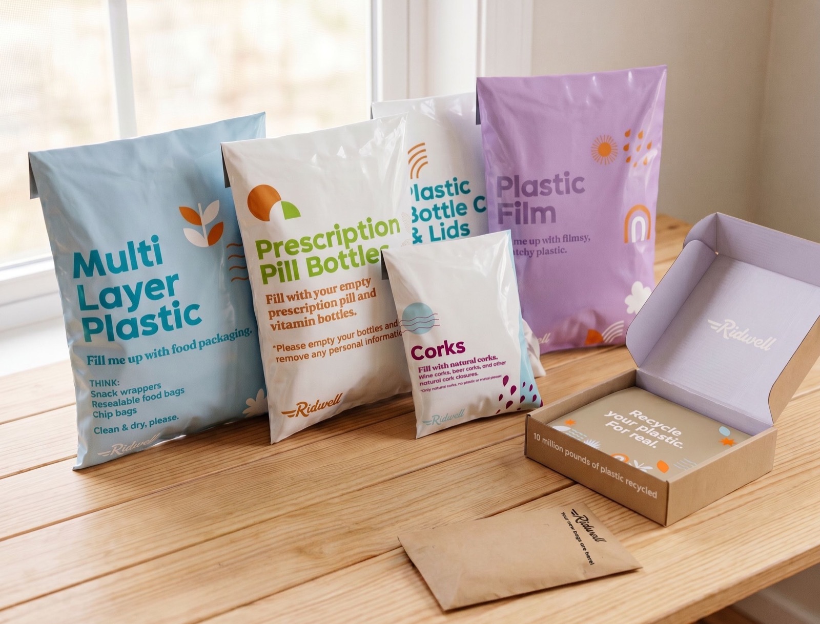 Custom recycled poly mailers and sustainable custom shipping boxes designed for Ridwell
