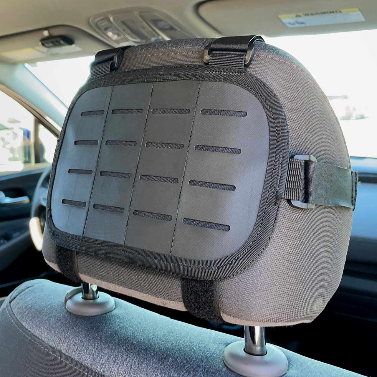 https://cdn11.bigcommerce.com/s-rd4j7/images/stencil/1280x1280/products/3159/12825/70-0593-MOLLEHead-Headrest-Mount-Empty-In-Use-2__93238.1678139475.jpg?c=2