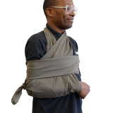 Rescue Essentials Triangle Bandage in use as sling Rescue Essentials Triangle Bandage in use as sling