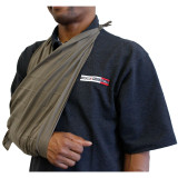 Rescue Essentials Triangle Bandage in use as sling Rescue Essentials Triangle Bandage in use as sling