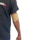 Rescue Essentials Mini Compression Bandage in use on arm
