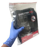 QuikLitter Drag, In packaging being held in hand