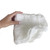 Hand holding loose gauze Hand holding loose gauze