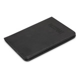 A black passport wallet with a textured surface and embossed branding on the front.