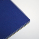 A dark blue welded A3 counter mat with a rounded corner, featuring a smooth surface.
